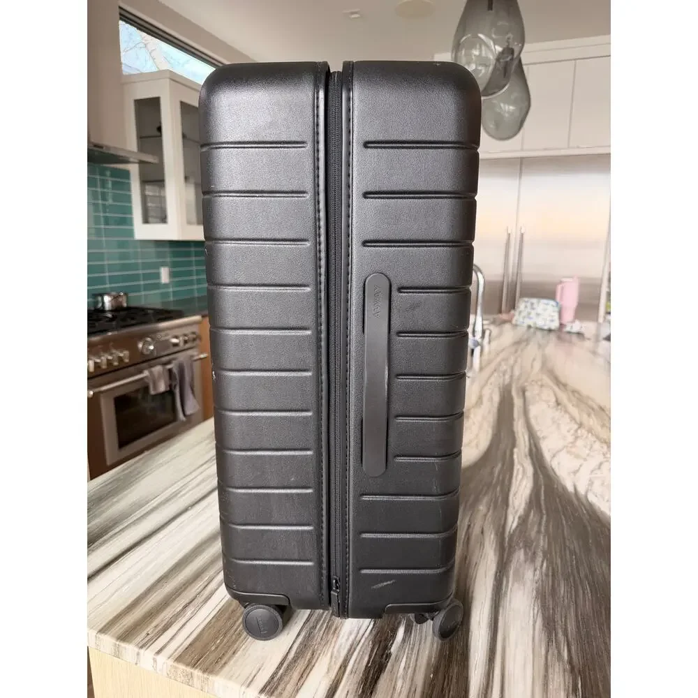 AWAY 24 in checked in luggage BLACK